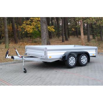 15.437 Przyczepa ciężarowa uniwersalna towarowa 2 osie hamowana alumina DMC 1300 kg Nowim